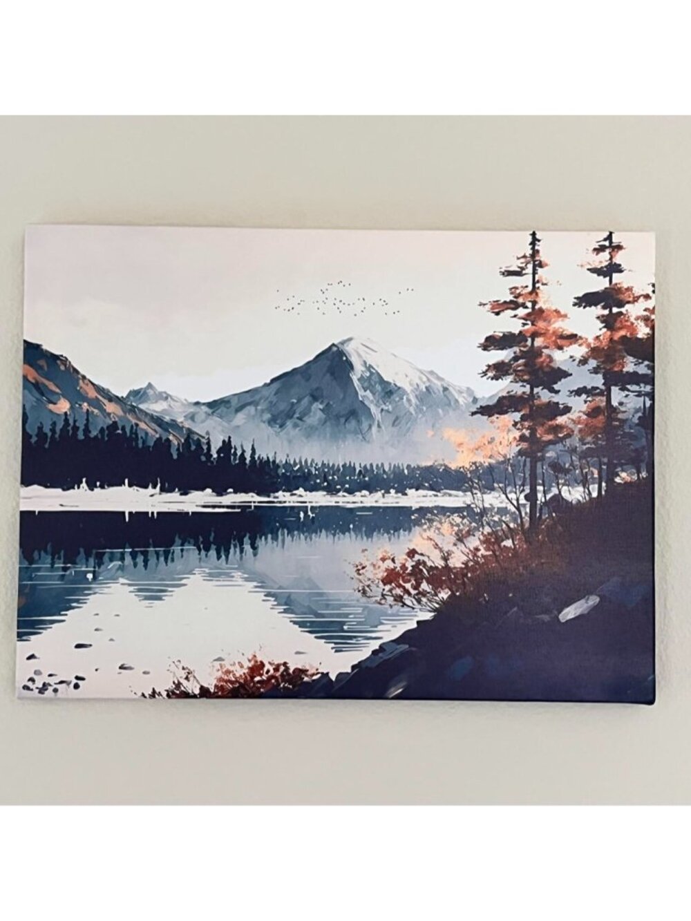 Canvas print of a mountain lake landscape with snow-capped peaks